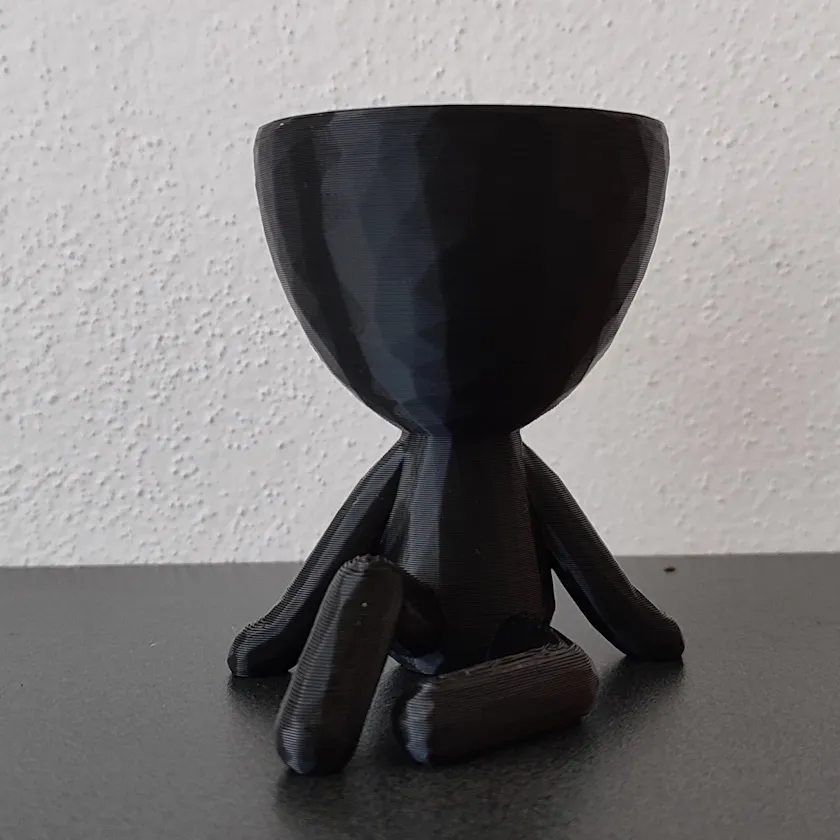 Maceta Robert Sentado - 9 cm